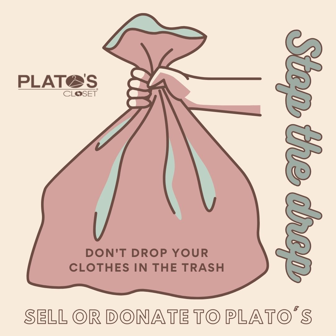 Hand holding trash bag